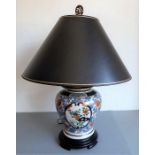A Japanese-style baluster-shaped porcelain lamp and shade; hand-gilded and decorated in the Imari