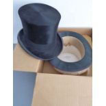 A silk top hat by G.A. Dunn & Co Ltd, London (boxed) and another unboxed example by Lock & Co -