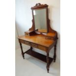 A late 19th century pitch pine dressing table; the central mirror flanked by two further smaller