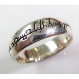 A large and heavy silver 'Lord of the Rings' band ring engraved with elfish-style script (boxed) (