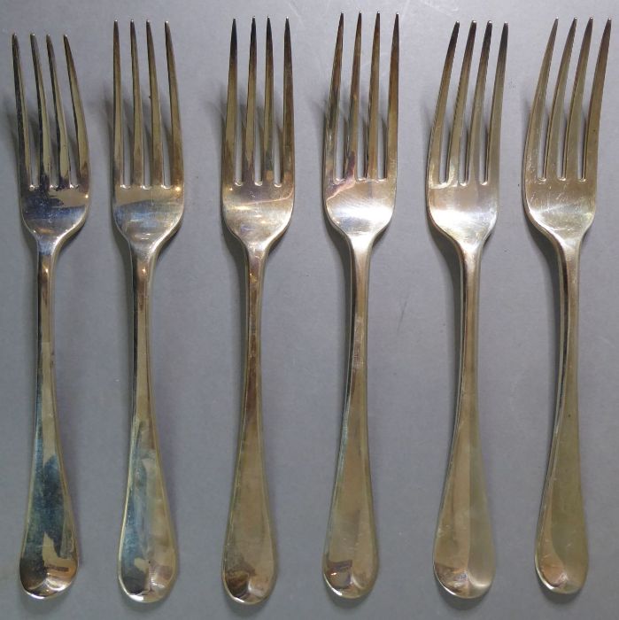 Six 19th century hallmarked silver table forks engraved with armorials. Varying year letters,
