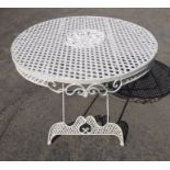 A metal garden table in 19th century style; white-painted latticework (95cm diameter)