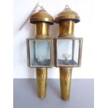 A pair of miniature antique brass coaching lamps (24cm)