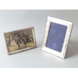 Two silver easel picture frames: one marked .925 and the other with Birmingham 1918 marks