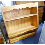 A set of wall-mounting pine shelves (79cm wide x 91cm high)