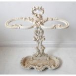 A heavy cast-iron stick/umbrella stand; white-painted, two-division in 19th century style (46cm