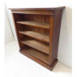 A 19th century mahogany open bookcase; adjustable shelves and raised on plinth base (90.5cm wide x