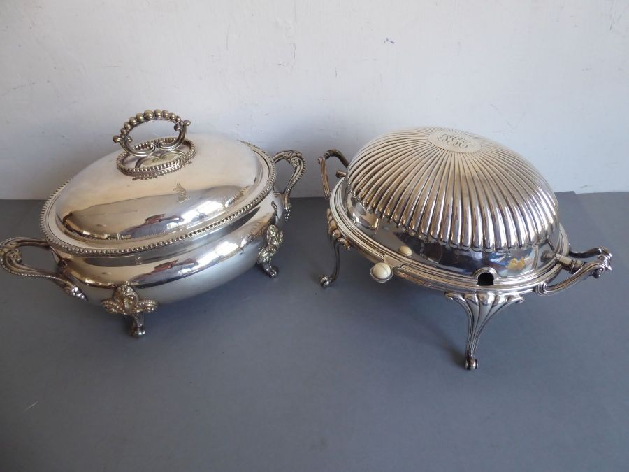 A fine and large 19th century two-handled silver plated tureen engraved with armorial crest,