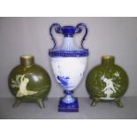 A matched pair of late 19th century Moore Bros. vases and a Royal Crown Derby vase by WEJ Dean.