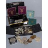 An assortment of various mostly silver coinage etc. to include shillings, a 1887 silver crown, other