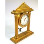 A small gilt-bronze clock in the Palladian style; the pediment depicting a chariot scene in