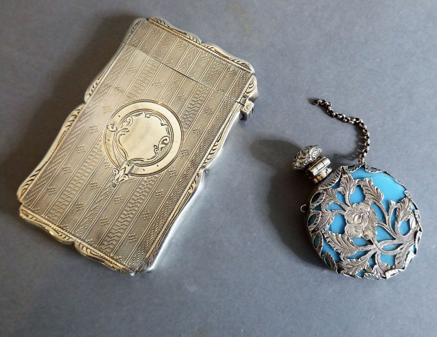 A silver card case (Birmingham 1882) and an ornate Edwardian scent bottle (a/f)