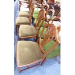 A set of four mahogany dining chairs in late 18th century style (later); each pierced splat with