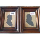 Two similar framed and glazed gentleman's portrait miniature silhouettes (the frames 17cm x 13.5cm)