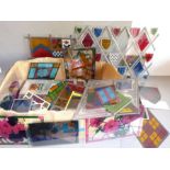 A selection of perspex and leaded light glass to include stained-glass-style ornamental shapes and