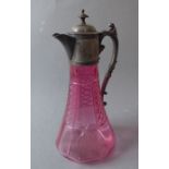 A Victorian cut-glass cranberry claret jug with silver-plated mounts