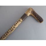 An interesting 19th century horn-handled walking stick made from shark's vertebrae with unengraved