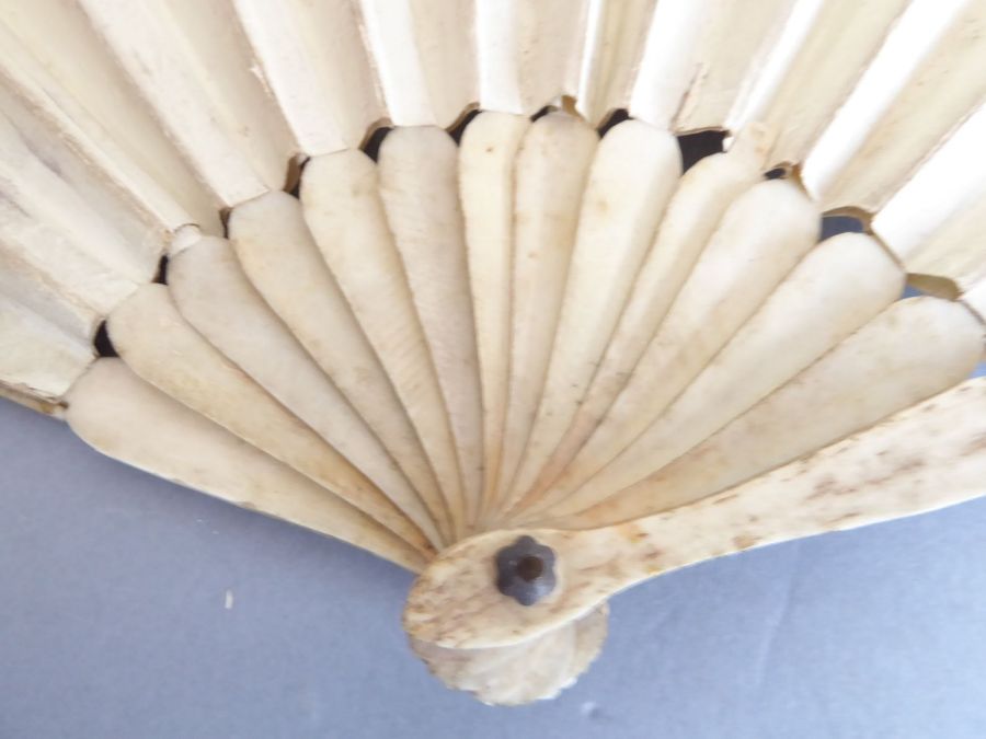 An early 20th century pierced wooden fan decorated with various Swiss costume, together with a - Image 4 of 10
