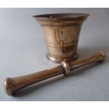 An 18th century bell-metal mortar with original pestle initialled T.F.E.