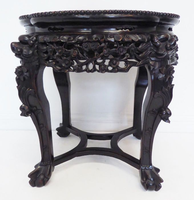 A 19th century Chinese carved hardwood and marble-topped jardinière stand; the gadrooned top with - Image 3 of 9