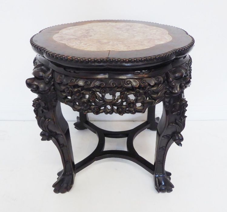 A 19th century Chinese carved hardwood and marble-topped jardinière stand; the gadrooned top with - Image 4 of 9