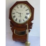 A mid-19th century oak-cased eight-day drop dial wall clock; the twelve-inch cream dial with Roman