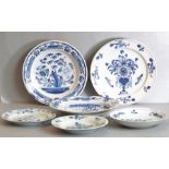 Delft - three bowls, 18th century, all three with chrysanthemums in vases, another with flowers,