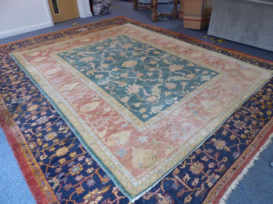 A modern hand-knotted Afghan K.K.Super Zeigler carpet with salmon and green ground (refugee - Image 2 of 6