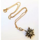 A late Victorian diamond set star brooch/pendant the twelve rayed star set with an old brilliant-cut