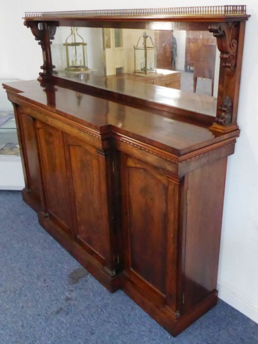 A fine early 19th century Regency period rosewood breakfront chiffonier; the three-quarter pierced