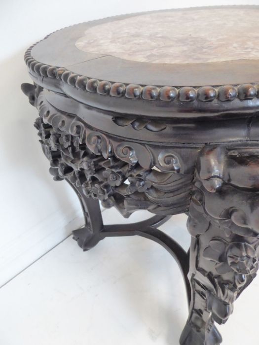 A 19th century Chinese carved hardwood and marble-topped jardinière stand; the gadrooned top with - Image 8 of 9