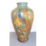 A large late 19th / early 20th century baluster-shaped pottery vase in the style of C.H. Brannam: