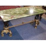 A classical-style late 19th / early 20th century centre coffee table; the polished green onyx top