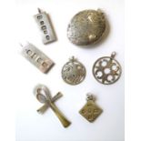 A good selection of silver pendants to include three ingot-style pendants, two circular pendants,