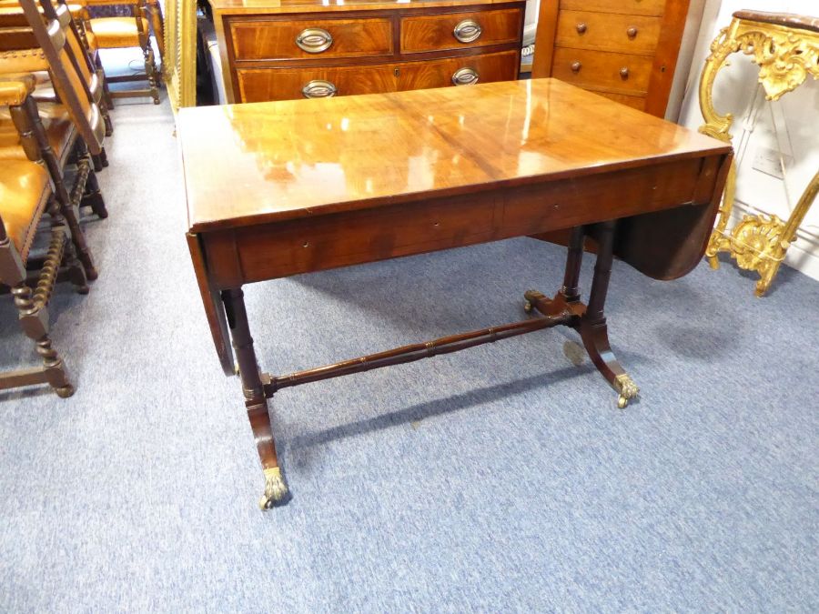 An early 19th century Regency period sofa table; the drop leaves flanking two half-width drawers, - Image 4 of 5