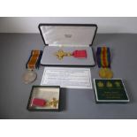 A modern OBE (mint condition) in its Fattorini case and two London Rifle Brigade WW1 medals: the