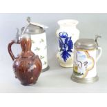 Four German / East European pieces: a German creamware Humpen of typical form, painted with sprigs