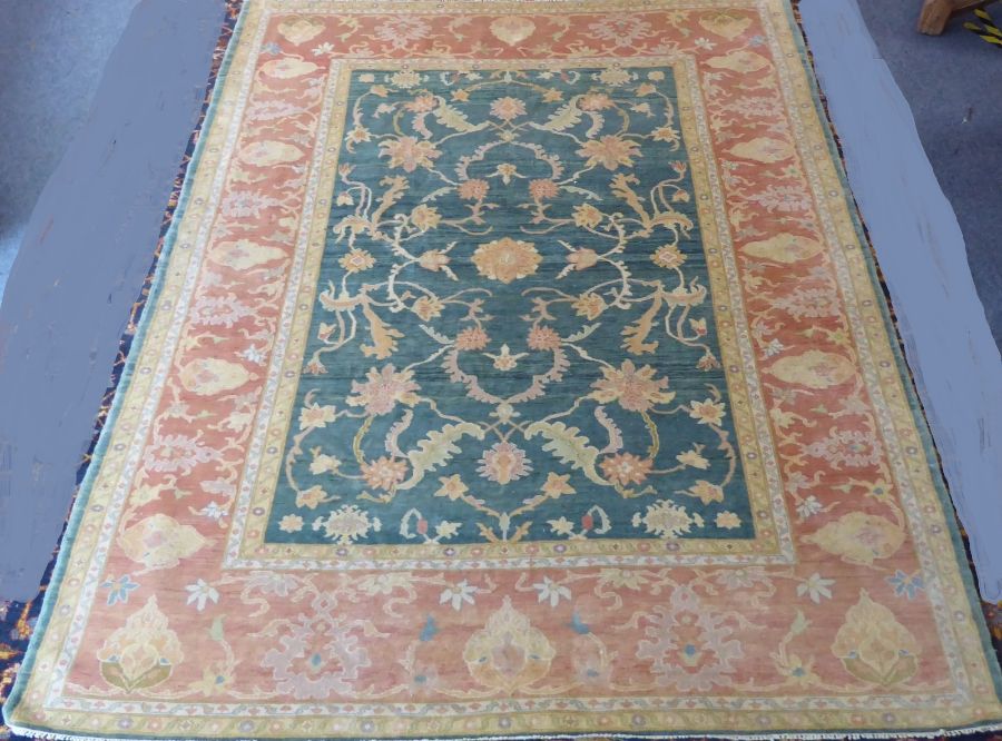 A modern hand-knotted Afghan K.K.Super Zeigler carpet with salmon and green ground (refugee