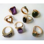 Eight assorted rings including three gem-set with diamond details to the 9-carat yellow gold mounts: