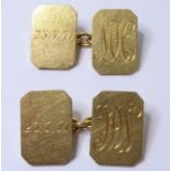 A pair of 18-carat yellow gold rectangular cut-cornered plaque cuff links, chain link connections