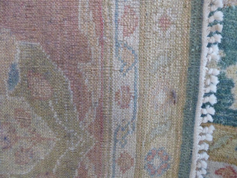 A modern hand-knotted Afghan K.K.Super Zeigler carpet with salmon and green ground (refugee - Image 6 of 6