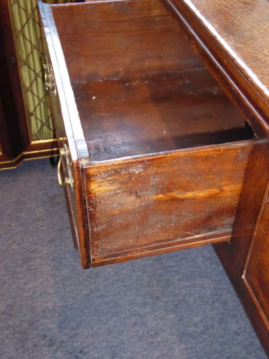 A good mid 18th century oak dresser base; the moulded top above three frieze drawers, the central - Image 4 of 8