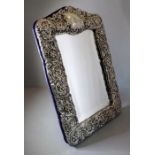 A large and modern hallmarked, filled, silver framed dressing table easel mirror in 19th century