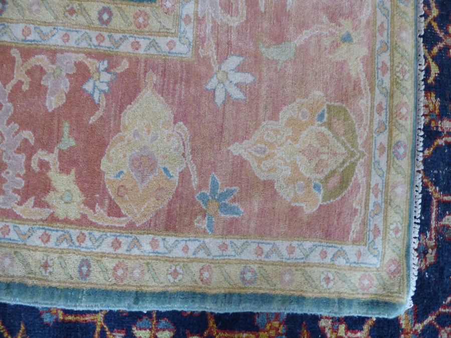A modern hand-knotted Afghan K.K.Super Zeigler carpet with salmon and green ground (refugee - Image 3 of 6