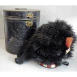 A Glasgow Highlanders feather bonnet in its japanned tin case. The ostrich feather bonnet by Thos.