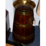 A 19th century two-handled brass coopered oak churn having averted rim (58cm high)