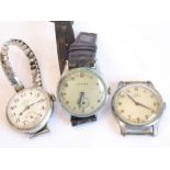 Three gentleman's wristwatches: a 1950s / 1960s Omega for restoration, a similar example signed