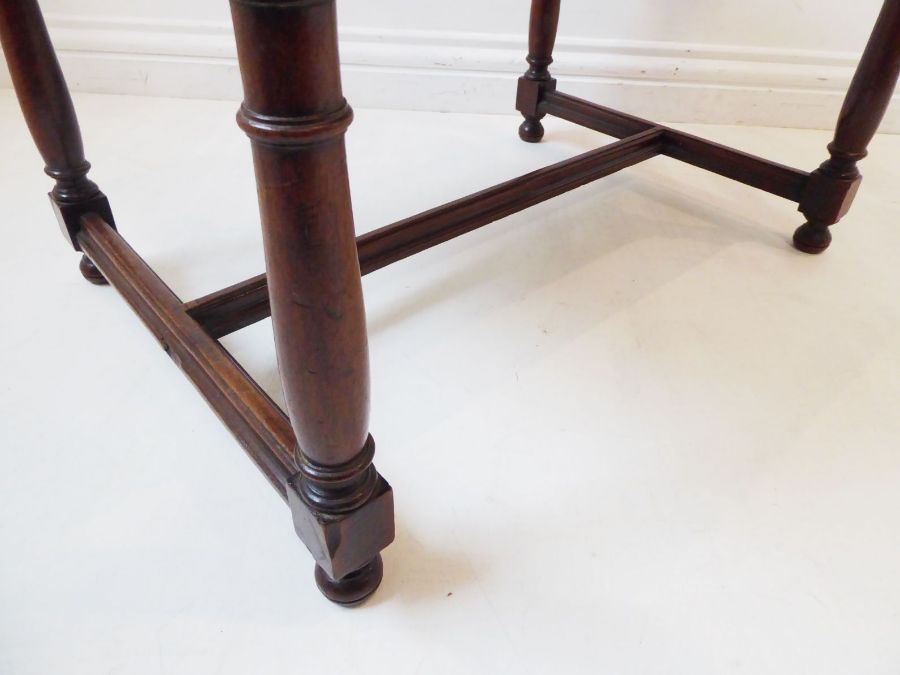 A 19th century walnut stool in earlier 17th century style; the two handles upholstered to the - Image 2 of 5