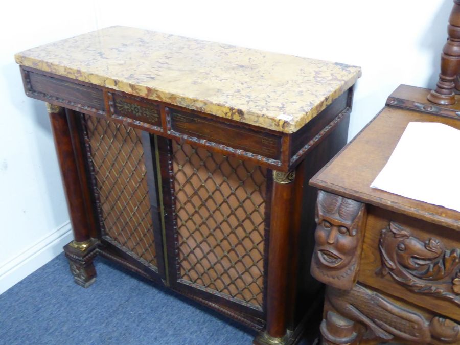 An early 19th century marble-topped Regency period brass-inlaid rosewood side cabinet; the frieze