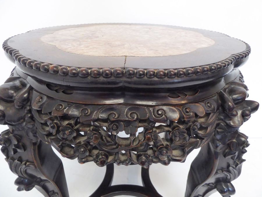 A 19th century Chinese carved hardwood and marble-topped jardinière stand; the gadrooned top with - Image 6 of 9